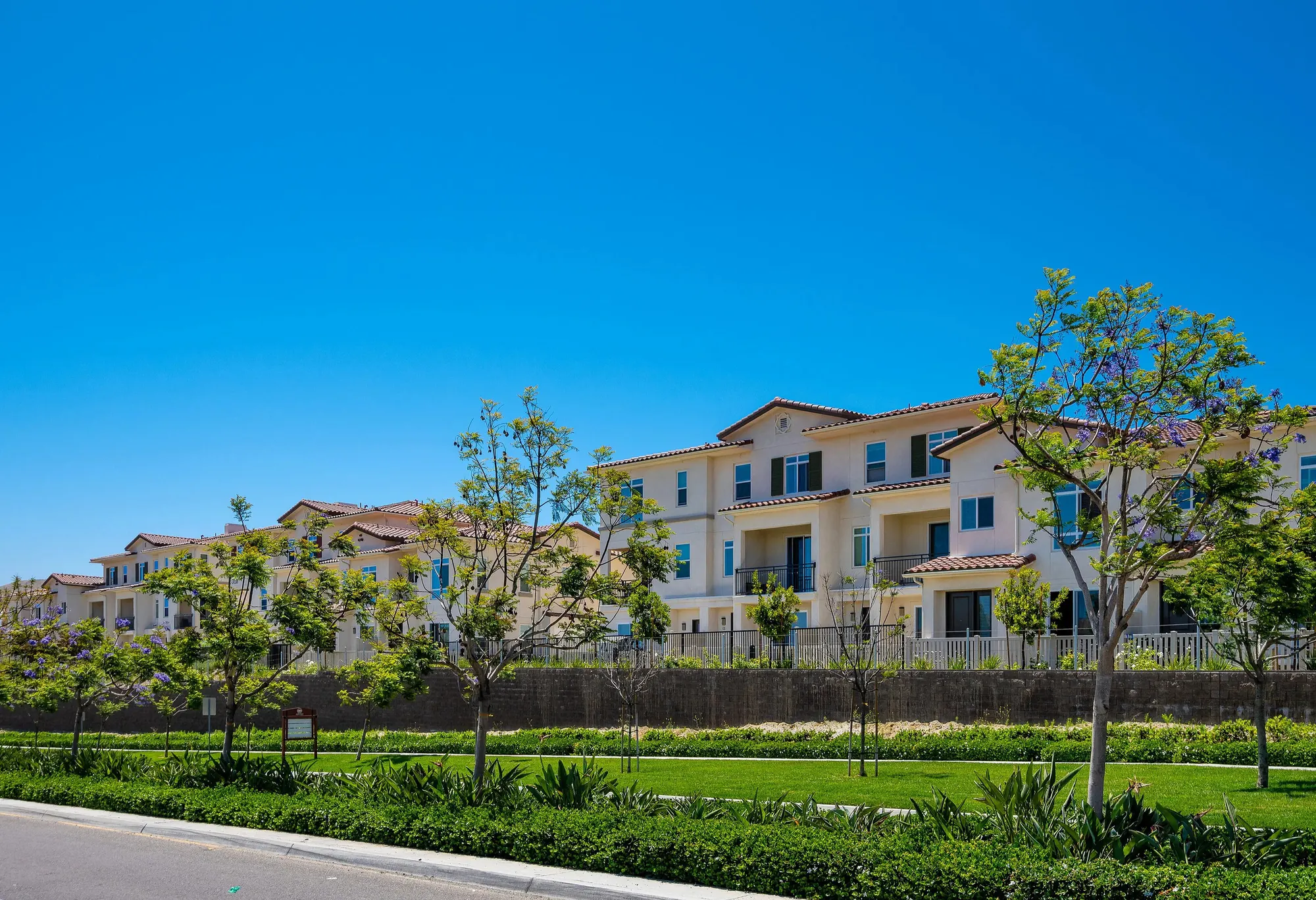 Enclave Heritage Flats apartment buildings and landscaping